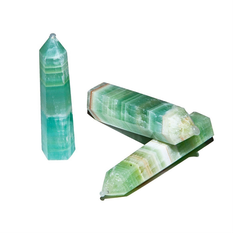 green calcite tower point